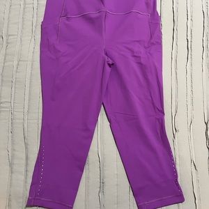 21” Lululemon leggings. Size 12. Only worn 2 times. Non smoking. Bright purple
